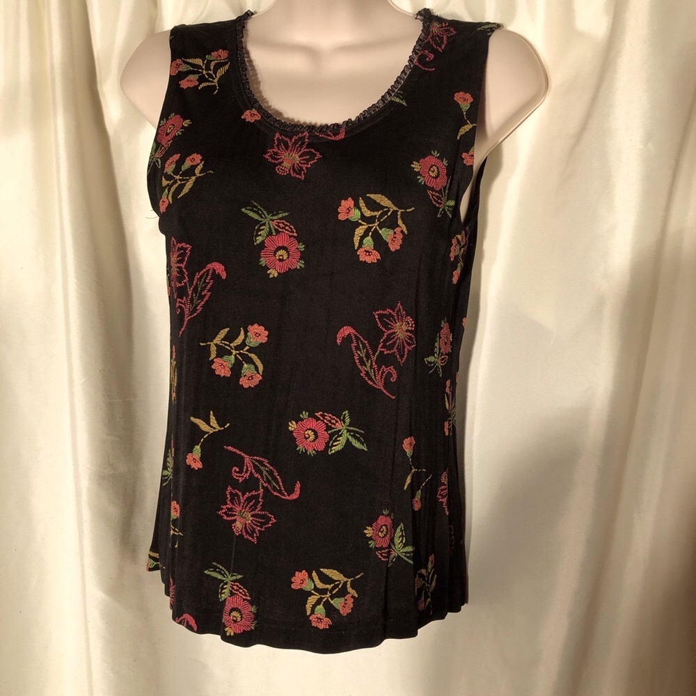 Black stretchy knit top with floral pattern
